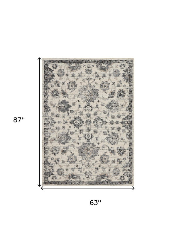 Homeroots 5' X 7' Cream And Gray Floral Distressed Area Rug  Polypropylene 551212