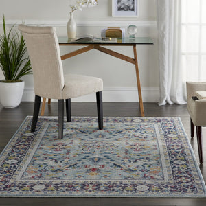 HomeRoots 5' Distressed Floral Area Rug in Teal Blue, Orange, and Black - Non-Skid and Durable Design 5' X 8' 551222
