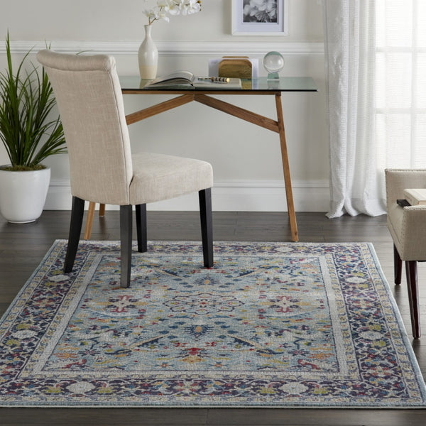 HomeRoots 5' Distressed Floral Area Rug in Teal Blue, Orange, and Black - Non-Skid and Durable Design 5' X 8' 551222