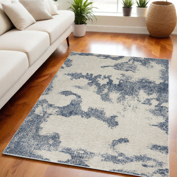 Homeroots 5' X 7' Light Blue And Ivory Abstract Non Skid Area Rug  Polypropylene,Polyester 551225