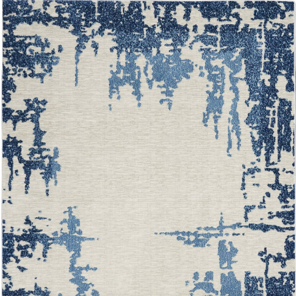 Homeroots 5' X 7' Blue And Ivory Abstract Distressed Non Skid Area Rug  Polypropylene,Polyester 551226