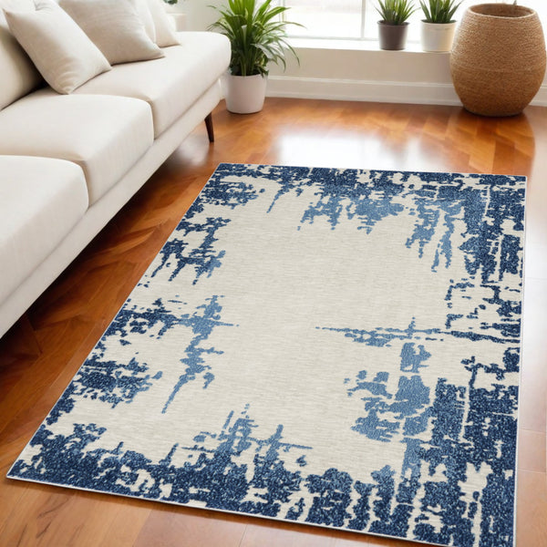 Homeroots 5' X 7' Blue And Ivory Abstract Distressed Non Skid Area Rug  Polypropylene,Polyester 551226