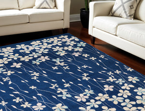 Homeroots 6' Navy Blue And Ivory Floral Area Rug - Durable, Stain Resistant, Ideal For Kids And Pets, 72x108" 8' X 10' Polypropylene 551229
