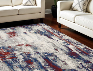Homeroots 8' X 11' Ivory Red And Blue Abstract Non Skid Area Rug  Polyester 551244