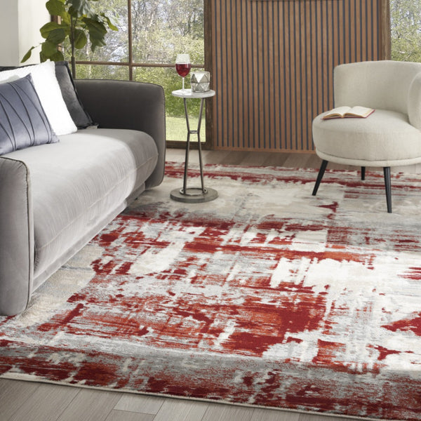 HomeRoots 5' Modern Abstract Ivory Red and Gray Area Rug with Non-Skid Backing for High-Traffic Spaces 8' X 11' 551253