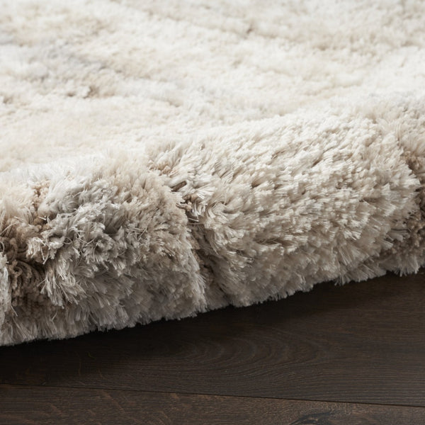 HomeRoots 5' Beige and Ivory Abstract Shag Area Rug - Luxurious, Cozy Texture Perfect for Any Room's Decor 7' X 9' 551263