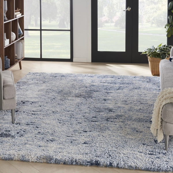 HomeRoots 5' Cozy Sky Blue Abstract Shag Area Rug – Plush, Stain-Resistant, Perfect for Modern Homes and Families 7' X 9' 551266