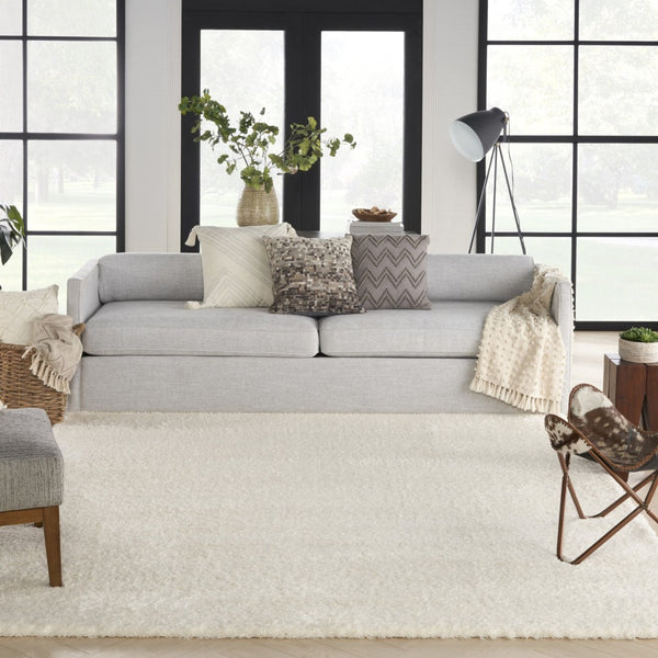 HomeRoots 4' Ivory Shag Area Rug - Luxuriously Soft, Durable & Versatile for Cozy Spaces, Kids & Pets Friendly 8' X 10' 551281