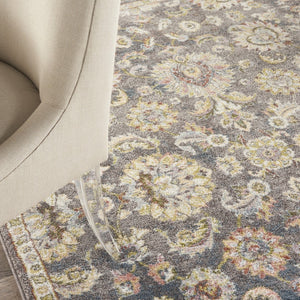 HomeRoots 5' Vintage-Inspired Charcoal Brown and Yellow Floral Distressed Area Rug for Modern Homes and Spaces 5' X 7' 551288