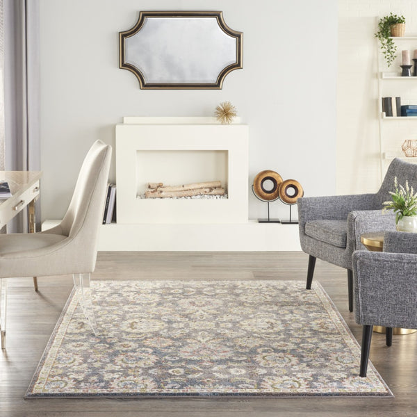 HomeRoots 5' Vintage-Inspired Charcoal Brown and Yellow Floral Distressed Area Rug for Modern Homes and Spaces 5' X 7' 551288