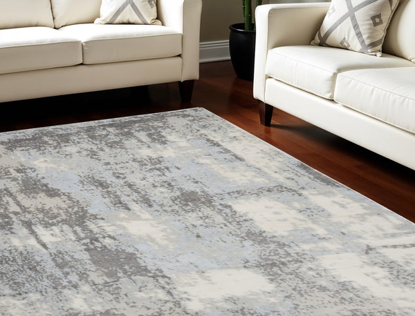Homeroots 8' X 10' Gray Ivory And Light Blue Abstract Non Skid Area Rug  Polypropylene,Polyester 551313