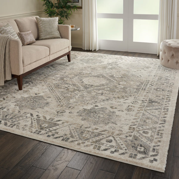 HomeRoots 5' Timeless Cream and Gray Floral Distressed Area Rug for Elegant Living Spaces and Durability 8' X 11' 551321