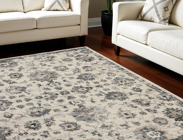 Homeroots 8' X 11' Cream And Gray Floral Distressed Area Rug  Polypropylene 551322