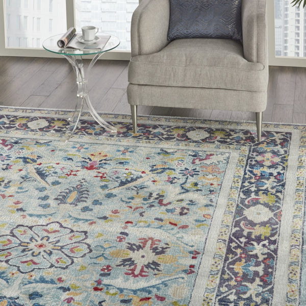 HomeRoots 5' Distressed Floral Area Rug in Teal Blue, Orange, and Black - Non-Skid and Durable Design 8' X 10' 551324