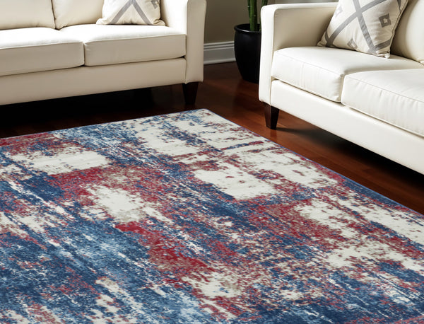 Homeroots 8' X 10' Ivory Red And Blue Abstract Non Skid Area Rug  Polypropylene,Polyester 551327