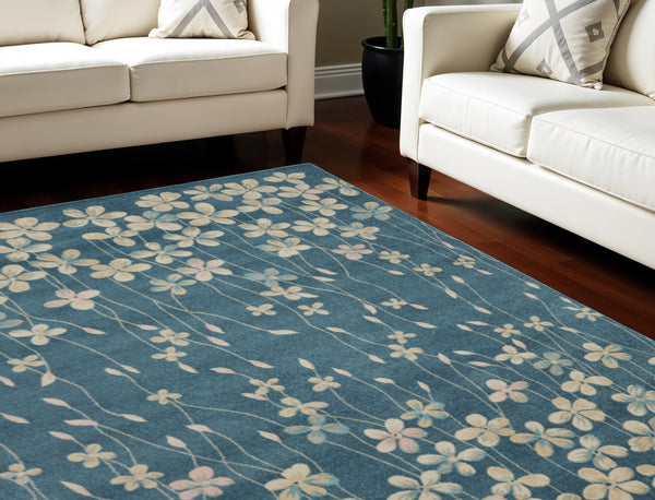 Homeroots 8' Turquoise And Cream Floral Area Rug - Durable, Stain-resistant Design For Stylish Comfort And Appeal 9' X 12' Polypropylene 551342
