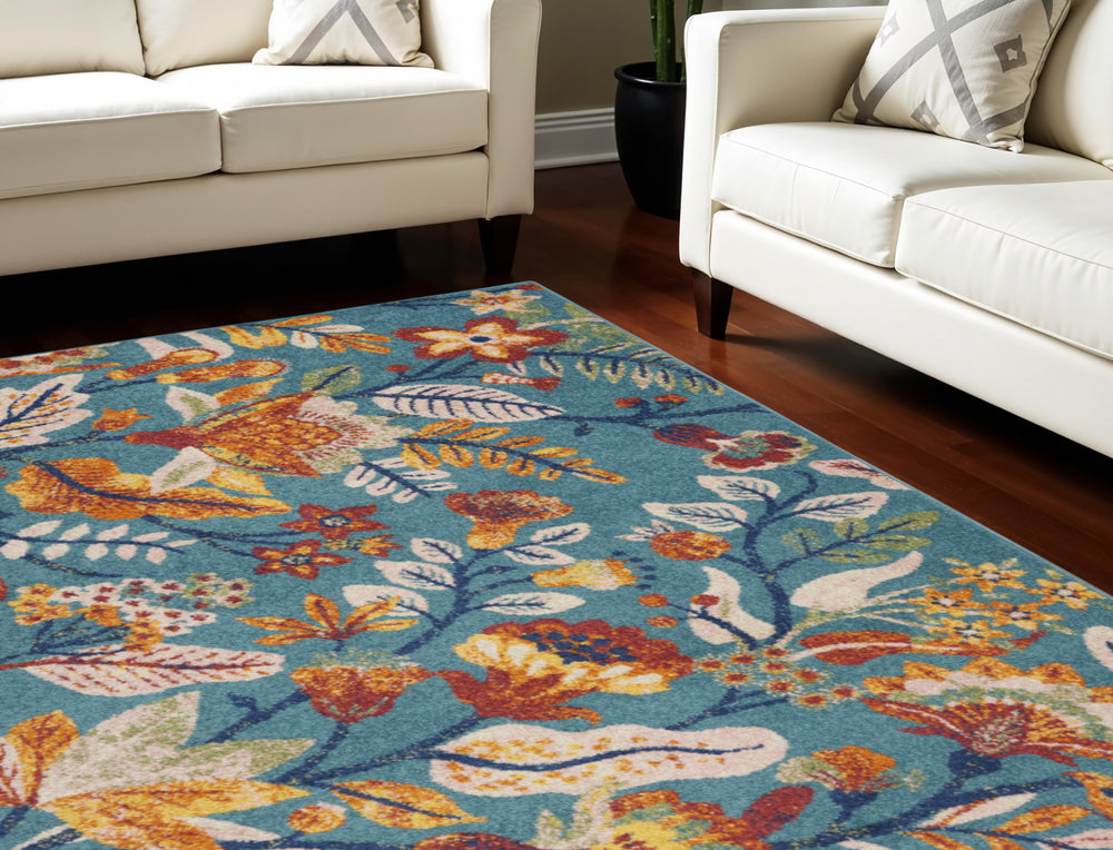 Homeroots 9' X 12' Aqua Floral Power Loom Area Rug  Polypropylene 551344
