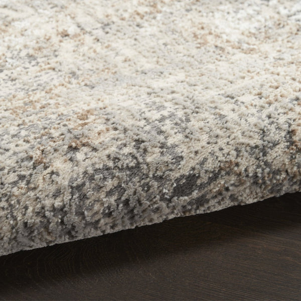 HomeRoots 5' Abstract Beige, Ivory, and Gray Non-Skid Area Rug - Modern, Stain-Resistant Design for Homes 9' X 12' 551346