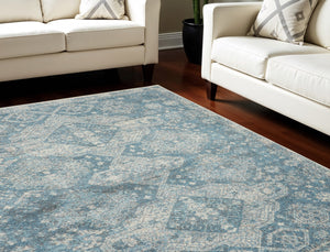 Homeroots 5' Ivory And Light Blue Medallion Distressed Area Rug - Durable, Stain Resistant, Stylish Design 9' X 12' Polypropylene 551356