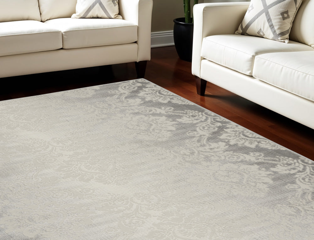 Homeroots 9' X 12' Gray And Ivory Damask Distressed Non Skid Area Rug  Polypropylene,Polyester 551369