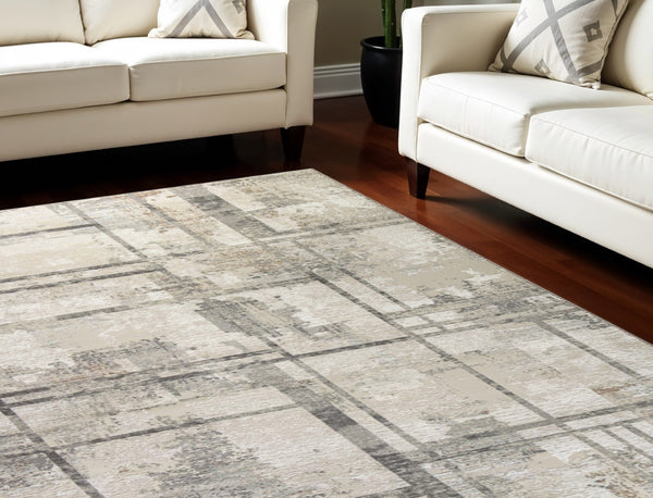 HomeRoots 5' Modern Abstract Area Rug in Ivory, Gray & Black - Durable, Stain-Resistant, Non-Skid Design 9' X 12' 551384