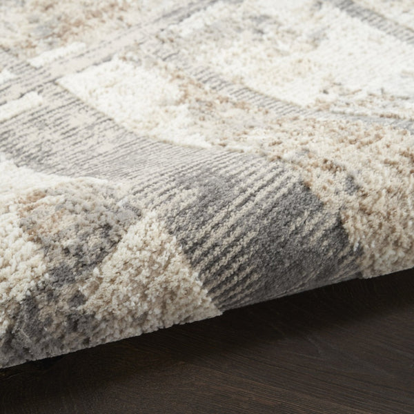 HomeRoots 5' Modern Abstract Area Rug in Ivory, Gray & Black - Durable, Stain-Resistant, Non-Skid Design 9' X 12' 551384
