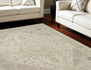 Homeroots 9' Ivory Pink & Gray Floral Medallion Distressed Area Rug - Durable, Stain-resistant, Stylish Decor Piece  Polypropylene 551391