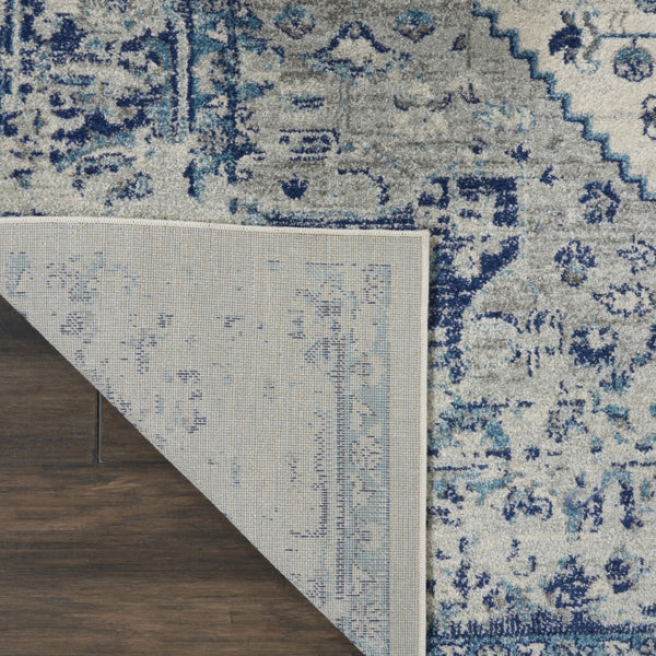HomeRoots 8' Ivory and Light Blue Floral Medallion Distressed Area Rug - Timeless Elegance for Any Space 9' X 12' 551393