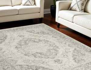 Homeroots 9' Ivory & Gray Floral Medallion Distressed Area Rug - Stain Resistant, Durable, Perfect For Homes!  Polypropylene 551394