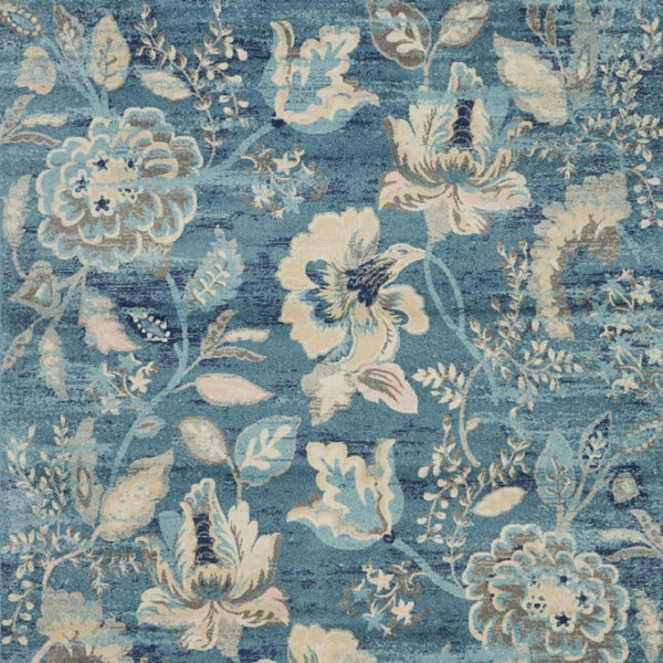 Homeroots 9' Turquoise And Cream Floral Distressed Area Rug - Durable, Stain Resistant, Ideal For Homes With Kids  Polypropylene 551395