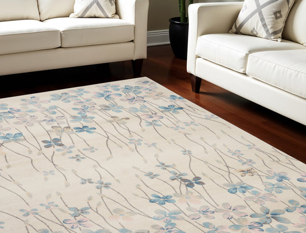 Homeroots 9' X 12' Ivory And Blue Floral Area Rug - Stain-resistant, Durable, Perfect For Homes With Kids & Pets  Polypropylene 551396