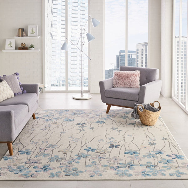 HomeRoots 5' Elegant Ivory and Blue Floral Area Rug - Durable, Stain-Resistant Design for Family Spaces 9' X 12' 551396