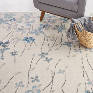 Homeroots 9' X 12' Ivory And Blue Floral Area Rug - Stain-resistant, Durable, Perfect For Homes With Kids & Pets  Polypropylene 551396