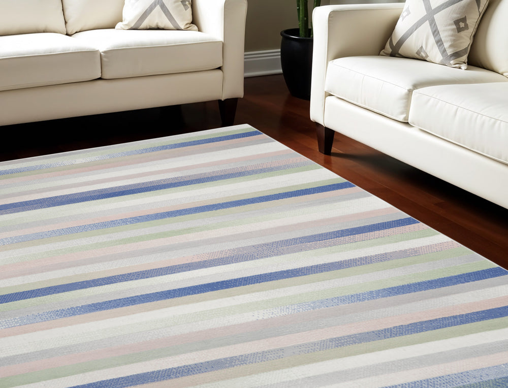 Homeroots 8' X 12' Ivory Tan And Blue Abstract Distressed Non Skid Area Rug  Polypropylene 551403