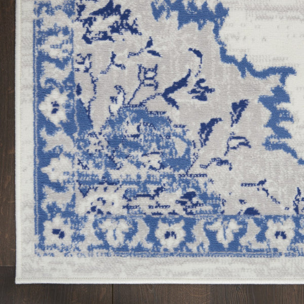 HomeRoots 7' Distressed Floral Medallion Area Rug in Ivory and Blue – Stain-Resistant, Non-Skid Comfort 8' X 12' 551405