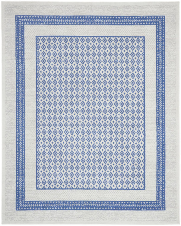 HomeRoots 8' Distressed Ivory and Blue Geometric Area Rug - Soft, Stain-Resistant, Non-Skid Design for Modern Homes 8' X 12' 551407