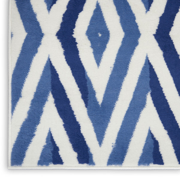 HomeRoots 8' Stylish Ivory and Blue Geometric Distressed Area Rug with Non-Skid Backing for High Traffic Areas 8' X 12' 551408