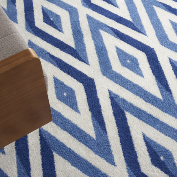 HomeRoots 8' Stylish Ivory and Blue Geometric Distressed Area Rug with Non-Skid Backing for High Traffic Areas 8' X 12' 551408