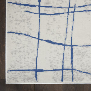 Homeroots 8' X 12' Ivory And Blue Abstract Geometric Distressed Non Skid Area Rug  Polypropylene 551410