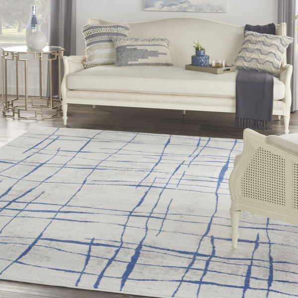 HomeRoots 7' Elegant Ivory and Blue Abstract Distressed Area Rug - Durable, Stain-Resistant, Stylish Design 8' X 12' 551410