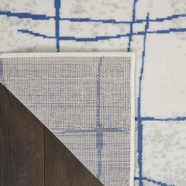 Homeroots 8' X 12' Ivory And Blue Abstract Geometric Distressed Non Skid Area Rug  Polypropylene 551410