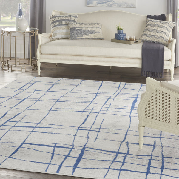 Homeroots 8' X 12' Ivory And Blue Abstract Geometric Distressed Non Skid Area Rug  Polypropylene 551410