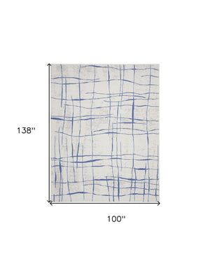 Homeroots 8' X 12' Ivory And Blue Abstract Geometric Distressed Non Skid Area Rug  Polypropylene 551410