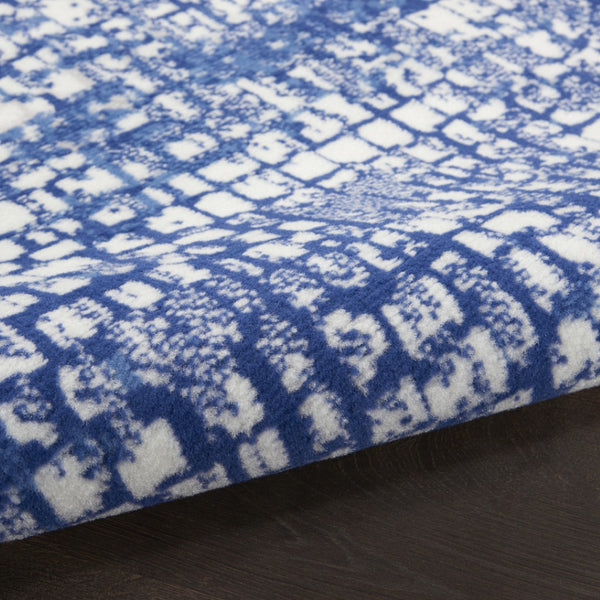 HomeRoots 8' Ivory and Navy Blue Abstract Area Rug - Modern, Stain-Resistant Design for High-Traffic Spaces 8' X 12' 551412