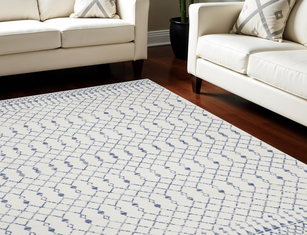 Homeroots 8' X 12' Ivory And Blue Geometric Distressed Non Skid Area Rug  Polypropylene 551413