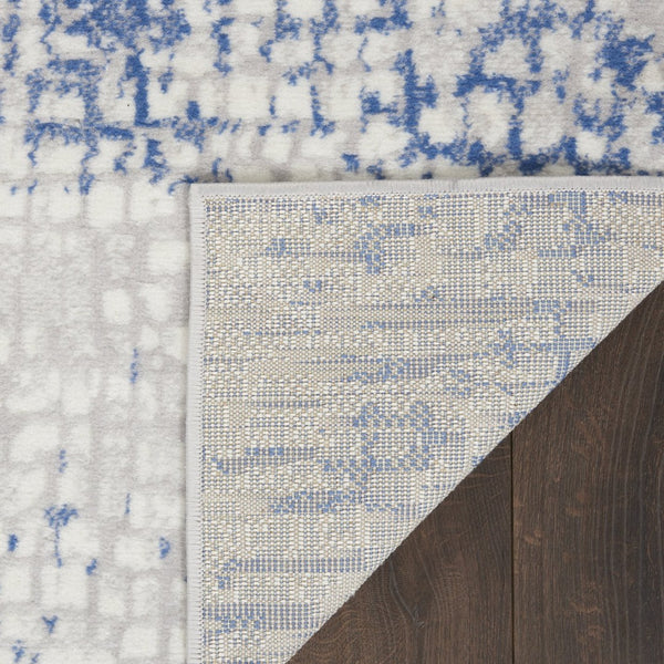 HomeRoots 8' Elegant Ivory and Blue Geometric Distressed Area Rug – Soft, Non-Skid, Stain Resistant Design 8' X 12' 551413