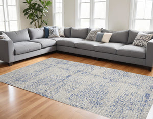Homeroots 7' Abstract Ivory Blue And Gray Distressed Non-skid Area Rug - Durable, Stain-resistant Design For Home 8' X 12' Polyester 551444