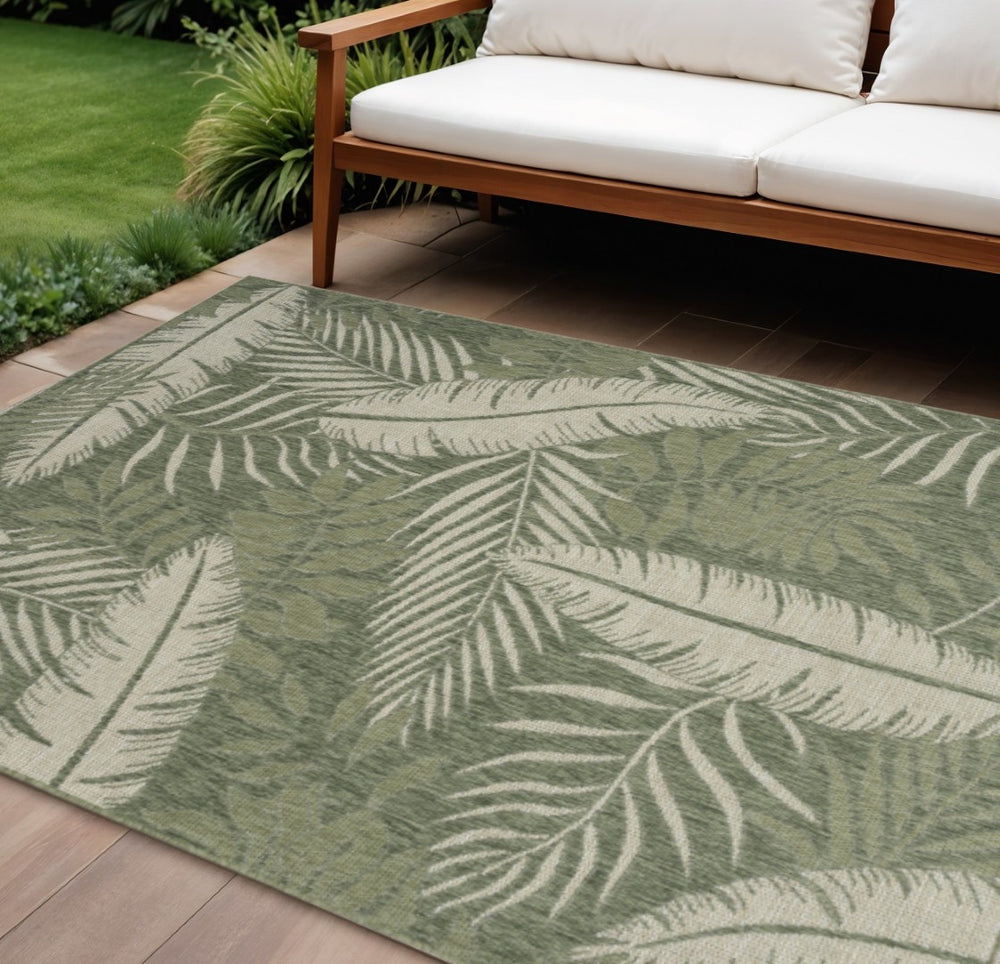HomeRoots 9' X 12' Ivory & Green Palm Leaf Rug - Versatile Indoor-Outdoor Décor for Coastal Living Spaces 551452