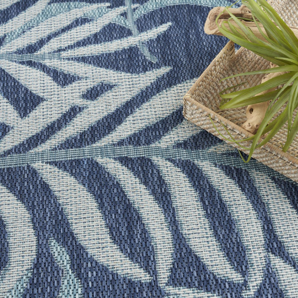HomeRoots 9' Navy Blue and Ivory Palm Leaf Area Rug - Durable Indoor/Outdoor Design for Coastal Elegance 551478