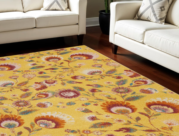 HomeRoots 9' Vibrant Yellow and Red Floral Power Loom Area Rug for Timeless Style and Warmth in Any Room 9' X 12' 551497